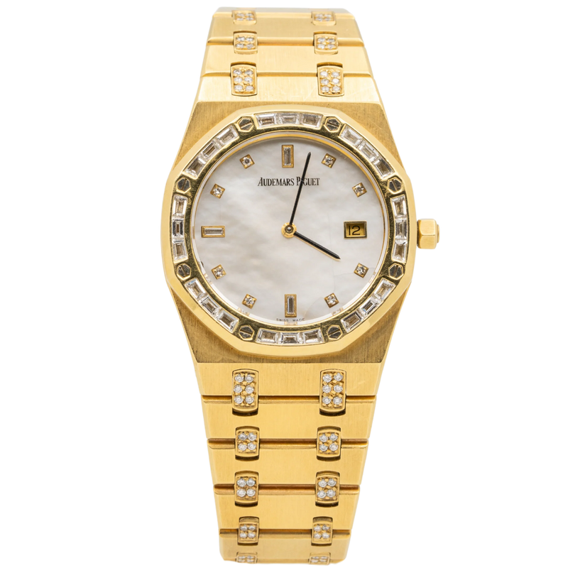 Audemars Piguet	Royal Oak Ref. 56602BA.ZZ.0789BA.04 33MM Yellow Gold Ladies  Factory Set Baguette Bezel and Bracelet with Mother of Pearl Dial - Audemars Piguet